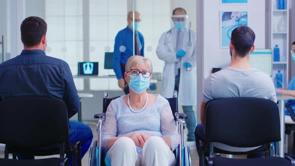 Worried Disabled Woman in Hospital Waiting Area