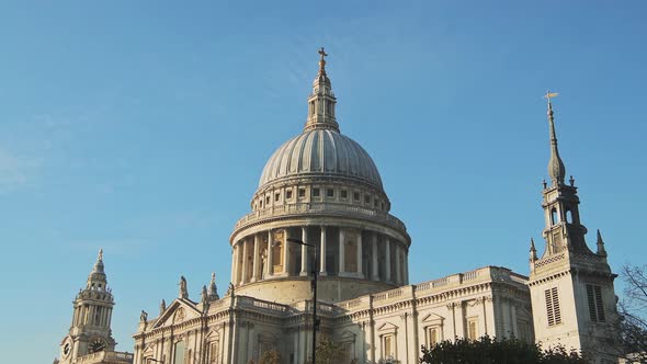 St Pauls Cathedral, a popular London tourist attraction and famous building on a bright blue sky day