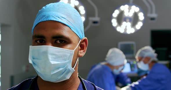 Male surgeon standing in the operation theater 4k