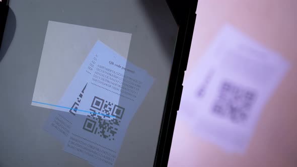 Smartphone Scanning QR Code in Paper Label