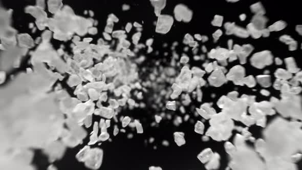 Super Slow Motion Detail Shot of Salt Flying Towards Camera at 1000Fps