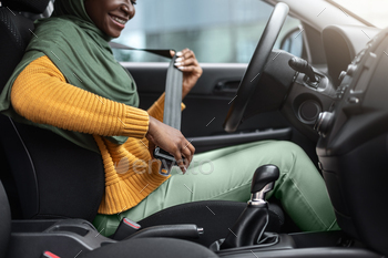 Hijab Fasten Seatbelt Before Car Ride, Responsible African Islamic Lady Driver Ready For Driving In City, Bought New Automobile, Cropped Image