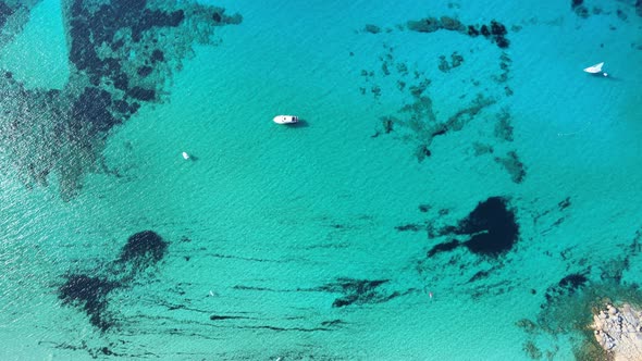 Beach, blue sea and yachts