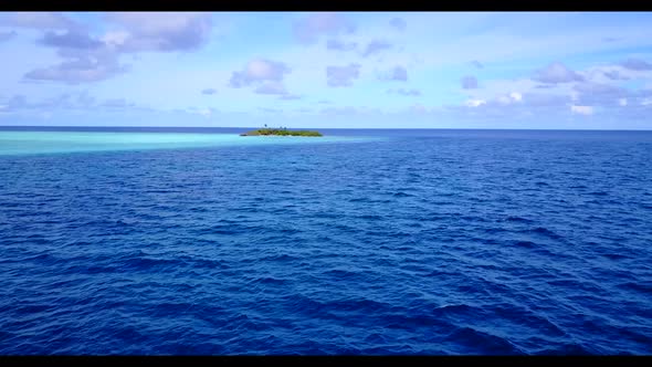 Aerial top down scenery of luxury lagoon beach lifestyle by blue sea and bright sand background of a