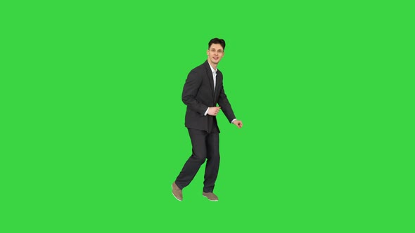 Very Cool Young Dancing Businessman on a Green Screen, Chroma Key