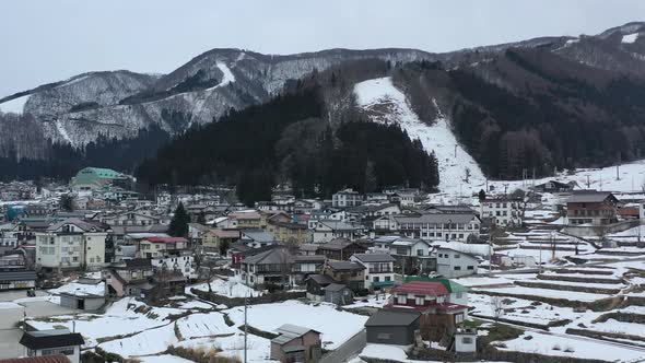 Japanese apartment buildings in nozawa onsen ski town in nagano japan during winter