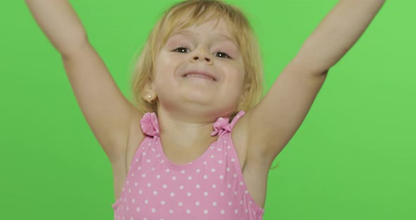 Positive Girl Emotionally Make Faces and Smile in Pink Swimsuit. Chroma Key