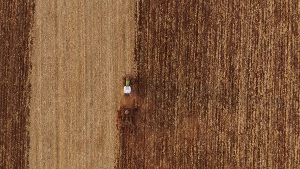 Aerial View Tractor Plowing Field