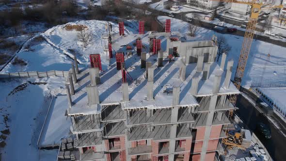 Aerial shot of building residental house on construction site.