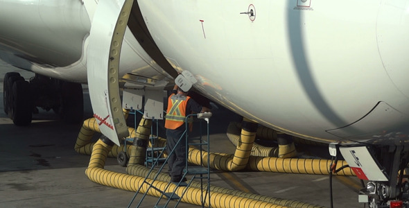 Airport Worker Opens Airplane Trap