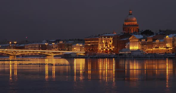 The Panoramic Footage of the Winter Night City SaintPetersburg with Picturesque Reflection n Water