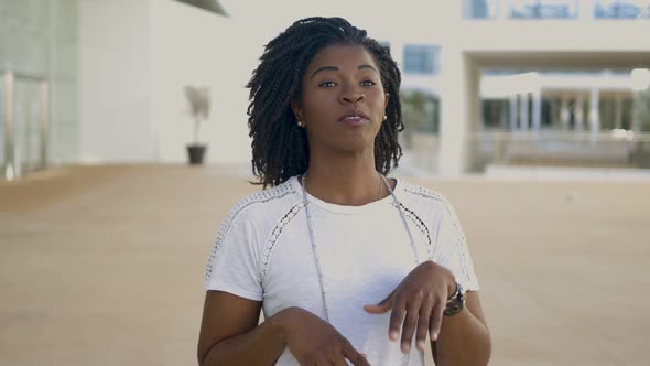 Happy African American Woman Talking To Camera