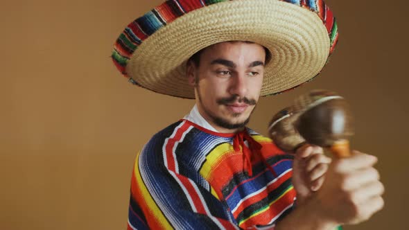 Young Mexican With Moustache Isolated On Yellow