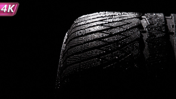 Sports Tire In Water Droplets