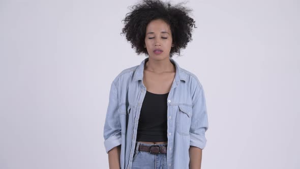 Young Angry African Woman with Arms Crossed