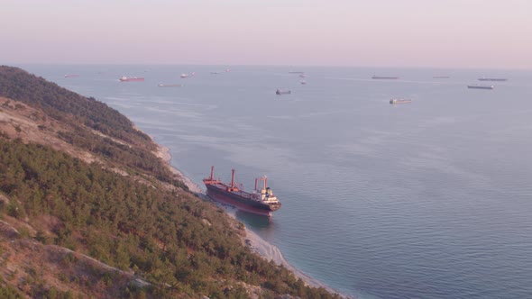 The Ship Ran Aground. Environmental Pollution at Sea. Aerial View. Grounded Ship. Drone Footage