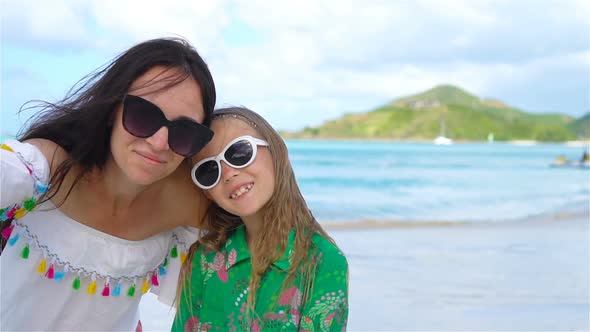 Beautiful Mother and Little Daughter on Caribbean Beach, Family Taking Selfie on Tropical Seashore