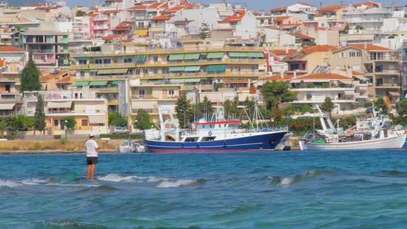 Touristic City. Traveling Concept. City and Seascape with Beautiful Color of Water. View From Boat