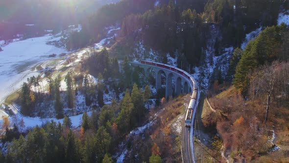 A Train in Switzerland Passing through Beautiful Landscapes