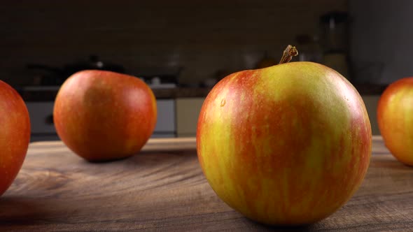 Ripe apples on a wooden board 