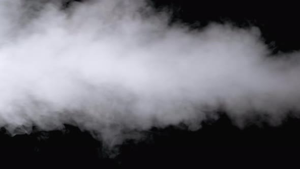 White Water Vapor. Jet of Vapour Steam on Black Background. Slow Motion