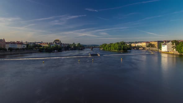Vltava River Timelapse Hyperlapse in District Strelecky Ostrov with the Bridge of the Legions and