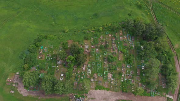 Cemetery in the Middle of the Green Field