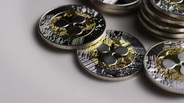 Rotating shot of Bitcoins (digital cryptocurrency) - Ripple