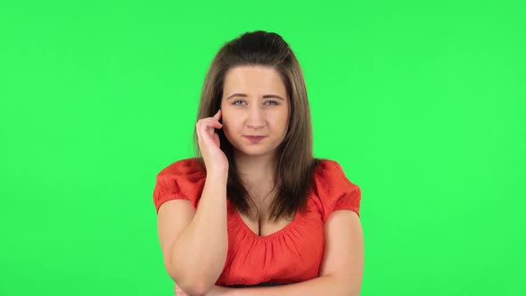 Portrait of Cute Girl Thinking About Something, and Then an Idea Coming To Her. Green Screen