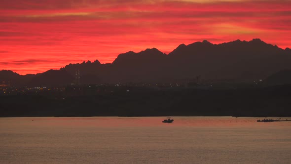 The Lights Of the City By the Sea In the Evening. One Can See the Outlines Of the Mountains