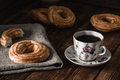 Few round eclairs with cup of coffee - PhotoDune Item for Sale