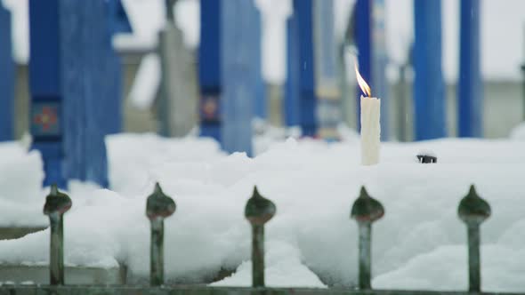 Burning candle at the Merry Cemetery