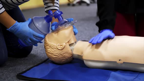 Medical male dummy on blue hospital blanket. 