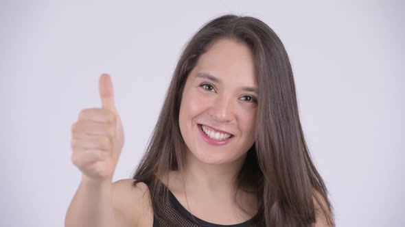 Young Happy Multi-ethnic Woman Giving Thumbs Up Ready for Gym