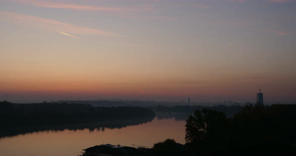 Sunrise Time Lapse on Danube River with Belgrade Buildings in Background