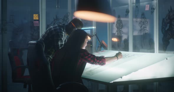 Graphic Designers Working on Video Game Concept Art