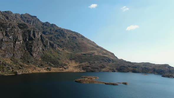 4k aerial drone footage over the 4th lagoon of Pichgacocha from Ambo, Huanuco, Peru in the Andes mou