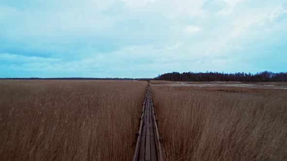 Old wooden tourist trail that runs through Lake Kanieres, concept of tourism