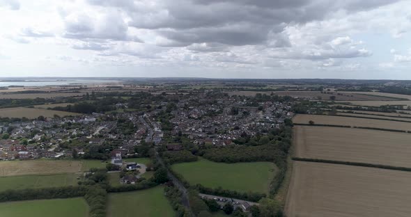 Right to left aeria pan looking over Tollesbury in Essex