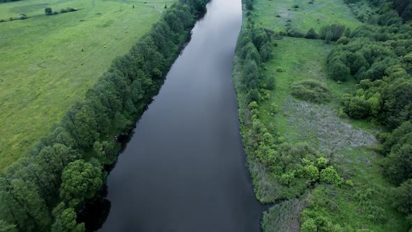 Aerial View of River and Field