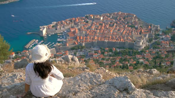 Woman Tourist Looking at City of Dubrovnik Croatia