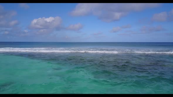 Aerial view travel of relaxing seashore beach time by transparent water with white sandy background 