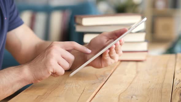 Man Working on Tablet