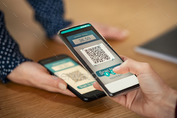  qr code with woman phone to transfer money. Girl hands holding smartphone to scan code for digital payment. Screen scanning with smartphone for qr-code payment.