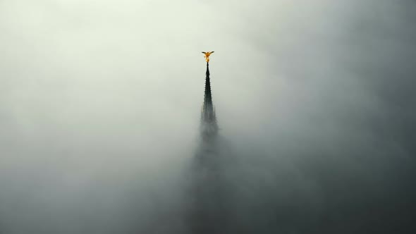 Drone Zooming in on Epic Golden Statue on Top of Famous Mont Saint Michel Fortress Castle Abbey