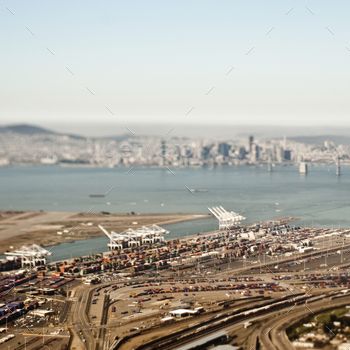 Aerial view of freight harbour with San Francisco skyline. / Photodune, Misc