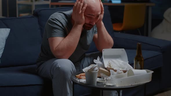 Sad Depressed Man Sitting on Couch Desperately Fatigue Loneliness