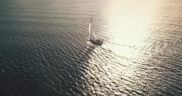 Aerial Yacht Sailing on Opened Sea at Sun