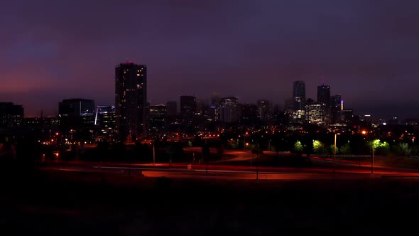 Denver Skyline Dramatic Sunrise in Fog Timelapse Pan and Zoom In