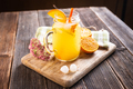 Lemonade drink with lemon slices, ice, orange juice in mason jars - PhotoDune Item for Sale